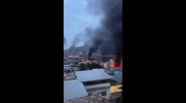 Explosions seen in Rio de Janeiro as dozens die in police clashes with cartels