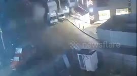 MOMENT - Seven-story building collapses in Türkiye killing two children