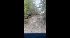 Trail Sodas Spill From Tipped Side-By-Side