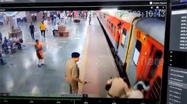 Heroic Rescue: Quick-Thinking Staff Saves Woman from Falling Under Train in Praygraj, Uttarpradesh