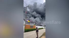 Fire erupts in factory with dozens of workers inside in Thailand