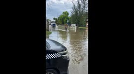 Jamaican Biker Feels The Water