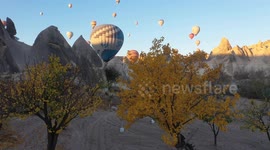Autumn colors and hot air balloons adorn Cappadocia’s fairy chimneys