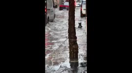 Floodwaters inundate García de Vinuesa Street in Seville, Spain