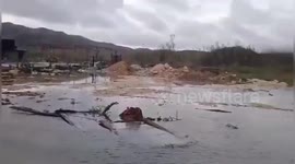 Hurricane Rafael Leaves Jamaican Village Submerged In Debris-Filled Floodwaters