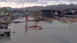 Jamaica: Hurricane Rafael Floods Jamaica Village With Murky Debris-Choked Waters