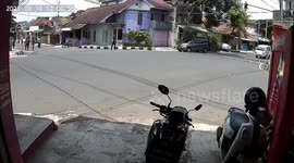 Minivan swerves to avoid hitting car but overturns into shop