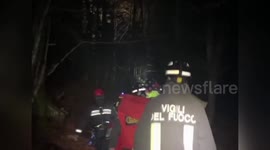 Hang glider pilot stuck in 100ft tall tree rescued in Italy