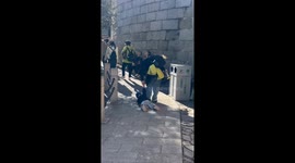 Tired boy adorably gets pulled up the Great Wall by his mom in Beijing, China