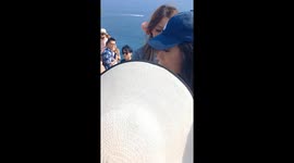 Female tourists fight in queue for selfies at Bali beauty spot