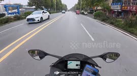 Motorcycle collides with electric bike rider in Henan, China