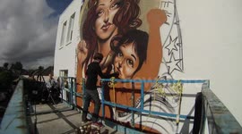 Time-Lapse of LA artist Mear One Painting mural. 'New World Revolution day three.'