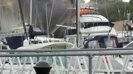 Firefighters battling the Kahu super boat blaze