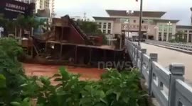 Boat crashes into bridge in typhoon waters