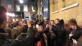 Jude Law Departs the Noel Coward Theater surrounded by fans
