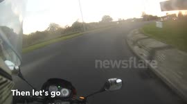 Biker Crashes On Roundabout