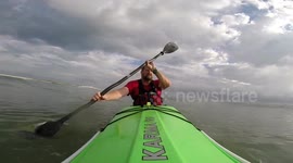 Kayaker has scary encounter with large shark