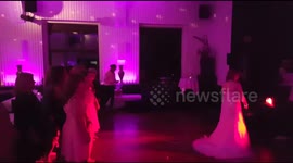 Woman face plants trying to catch bouquet at wedding in epic fail