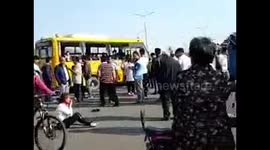 At least two dead after primary school bus hit by lorry
