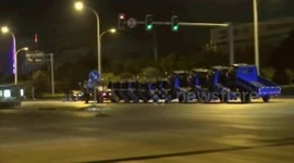 Unlicensed driver drives lorry to drag ten motorcycles