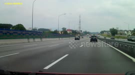 Lorry tyre bursts on motorway in Malaysia