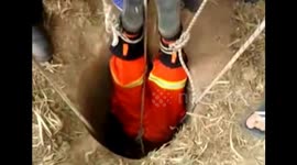 Firefighters rescue a boy falling into deep well