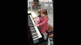 Piano playing twins