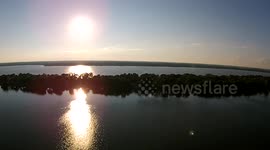 Stunning 'dronie' over a green lake