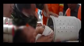 Boy gets stuck in washing machine