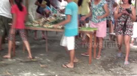watch these Filipino's eat with there hands not even plates are used