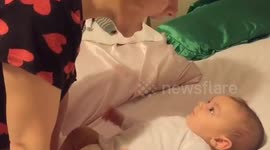 Three-month-old baby seems to say 'I love you' to his mother