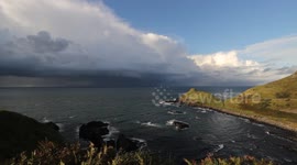 Beautiful storm clouds on the Giant's Causeway coastline