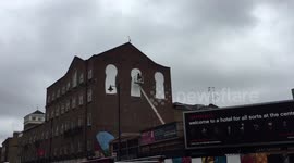 Stik's working on his new graffiti in London
