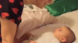 Three-month-old baby seems to say 'I love you' to his mother