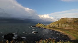 Beautiful storm clouds on the Giant's Causeway coastline