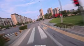 Electric dirt bike crashes into bushes in Anhui, China