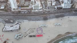 DRONE - Activists stage beach protest against Netanyahu near US Embassy in Israel