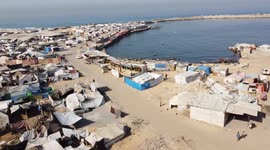DRONE - Gaza Port shelters thousands of displaced Palestinians amid dire conditions