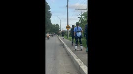 Rollerblader Trips Over Sidewalk Crack