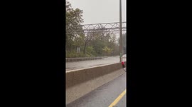 Heavy flooding submerges Long Island Expressway in Queens, New York