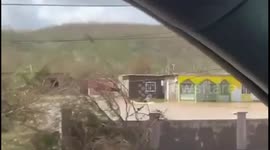 Hurricane Melissa leaves residents paddling through flooded streets in Jamaica