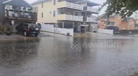 Streets submerged after heavy rain in Long Beach, New York, USA