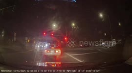 Speeding Car In The Wrong Lane Runs Red Light