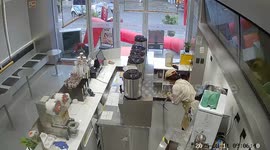 Beverage dispensers topple onto café worker in Anhui, China