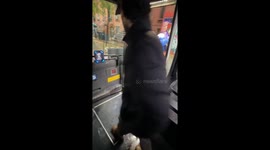 Floodwaters pour into bus after heavy rainfall in New York, USA