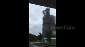 Newsflare Edit - Typhoon Megi blows scaffolding off building in Taiwan, injuring three