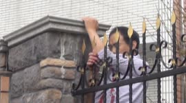 Electrician's arm impaled by fence