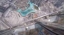 iPhone 10 Year Anniversary - Here's a guy dropping one off the tallest building in the world