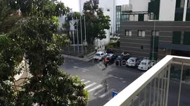 Mountain biker almost hits two persons who cross police line