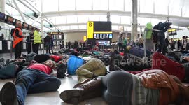 Protesters stage 'die-in' at London Heathrow airport